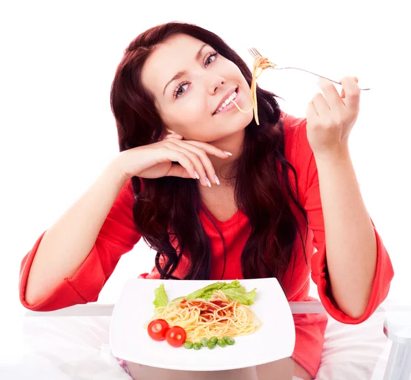 Vrouw eten spaghetti — Stockfoto
