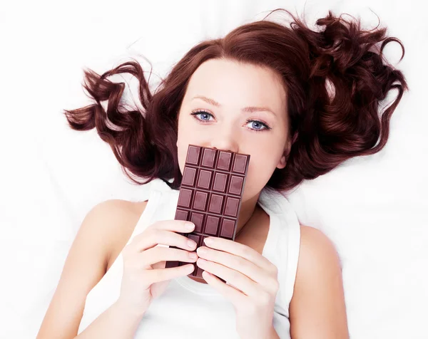 Vrouw met chocolade Stockfoto