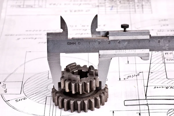 Calliper with part on Engineering drawing — Stock Photo, Image