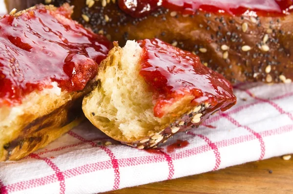 stock image Sweet bread ( challah ) with strawberry jam