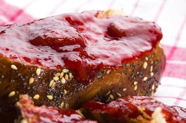 stock image Sweet bread ( challah ) with strawberry jam