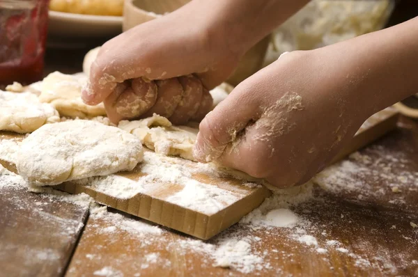 Detail of hands kneading dough — Stock Photo, Image