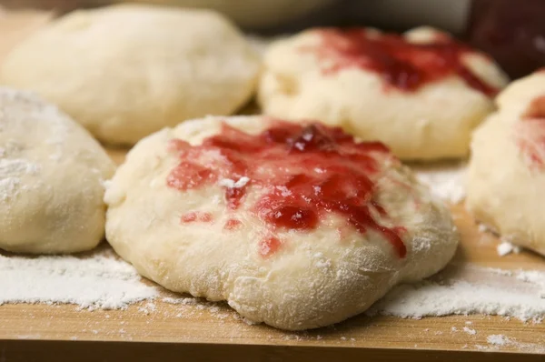 stock image Sweet doughnuts with rose marmelade