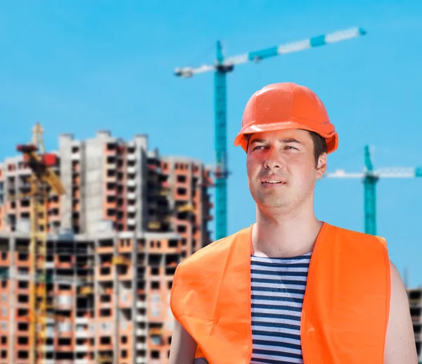Builder arbetare i uniform och hjälm — Stockfoto