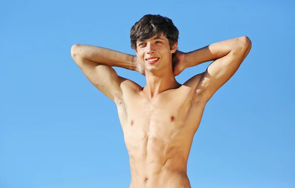 The portrait of young man with perfect body outdoor — Stock Photo, Image