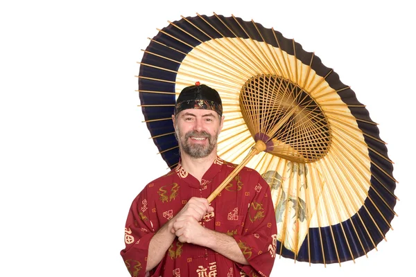 European in Chinese shirt and umbrella — Stock Photo, Image