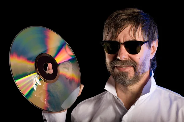 Homem com o disco laser retro — Fotografia de Stock