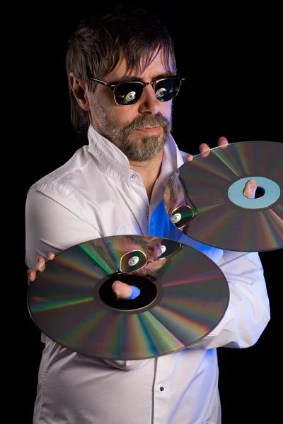 Man holds a retro laser discs — Stock Photo, Image