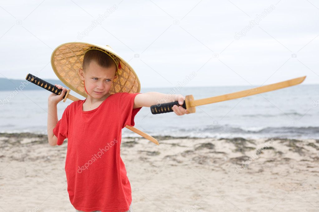 Boy with children samurai swords