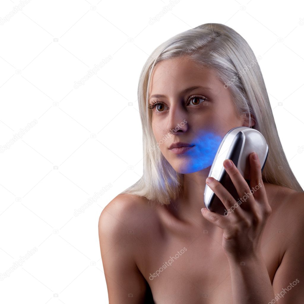 Young woman getting phototherapy treatment