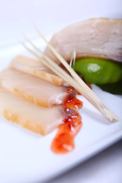 Raw white fish with sauce — Stock Photo, Image