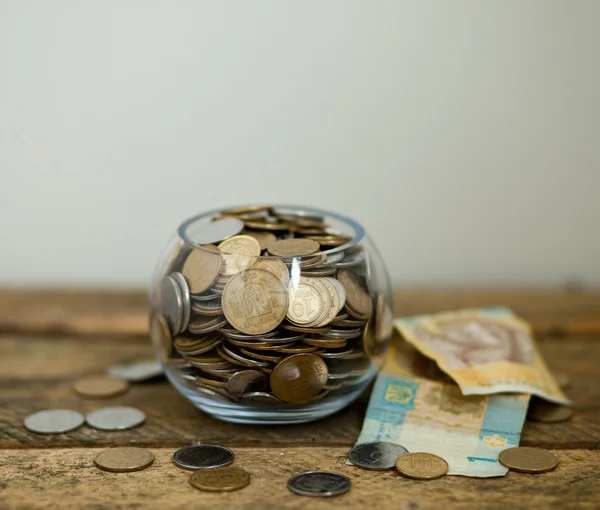 Ukrainian coins and hryvnas shows poverty — Stock Photo, Image
