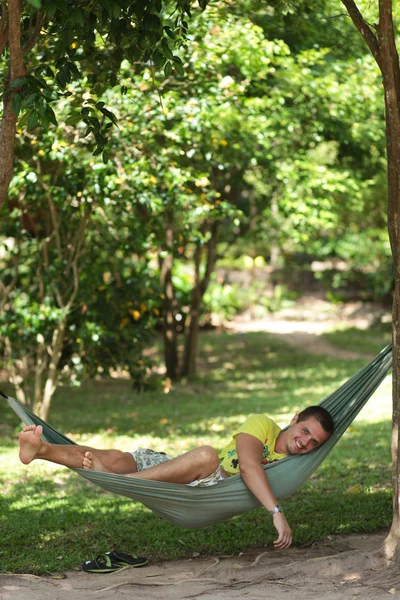 Man in a hammock — Stock Photo, Image
