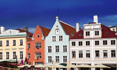 Old city, Tallinn, Estonia. Bright multicolor houses on the Town hall square. clipart
