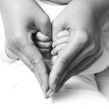 Baby holding mother hand clipart