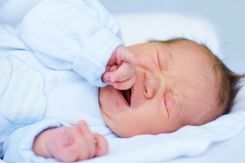 Crying newborn baby girl