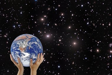 Planet earth on palm.Elements of this image furnished by NASA clipart