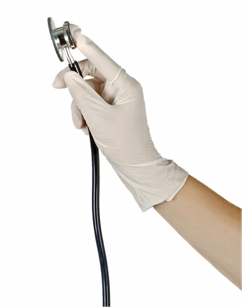 Hand met stethoscoop — Stockfoto