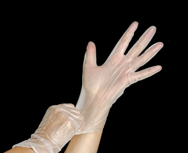 Hands in gloves — Stock Photo, Image