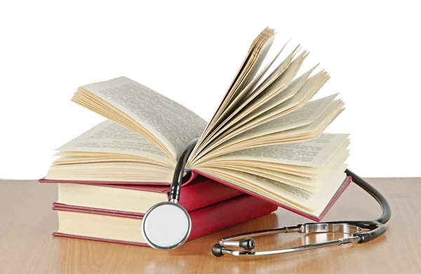 stock image Stethoscope and books