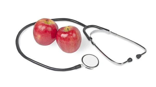 Apfel mit Stethoskop — Stockfoto