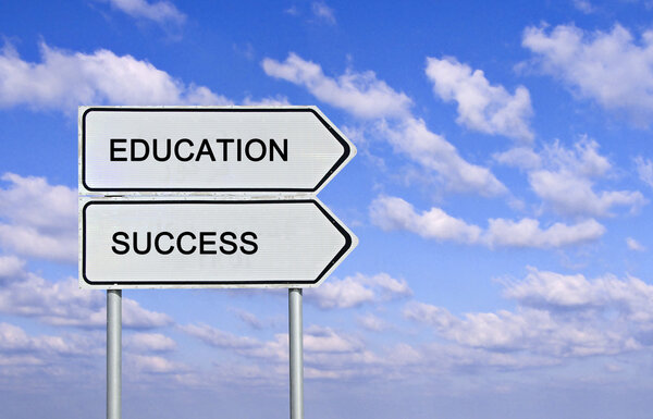 Road sign to eduacation and success