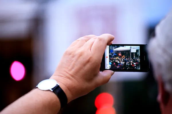 Man shot with smartphone — Stock Photo, Image