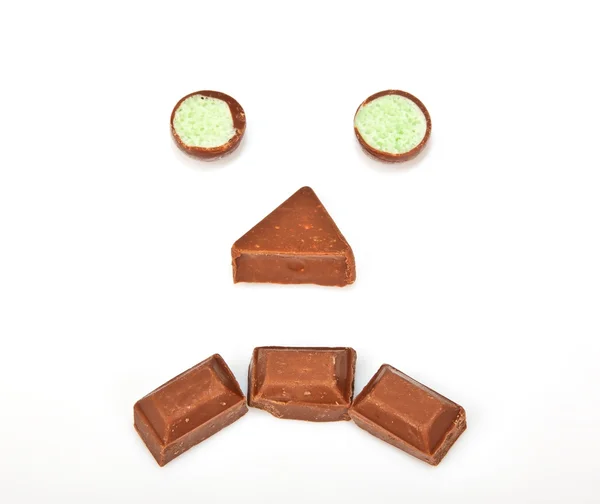 Sad face made out of chocolate — Stock Photo, Image