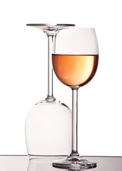 Empty and full crystal wine glasses — Stock Photo, Image