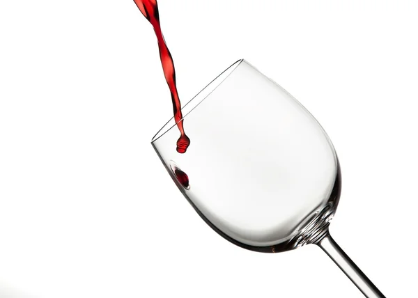 Stains rode wijn gegoten in een glas wijn — Stockfoto