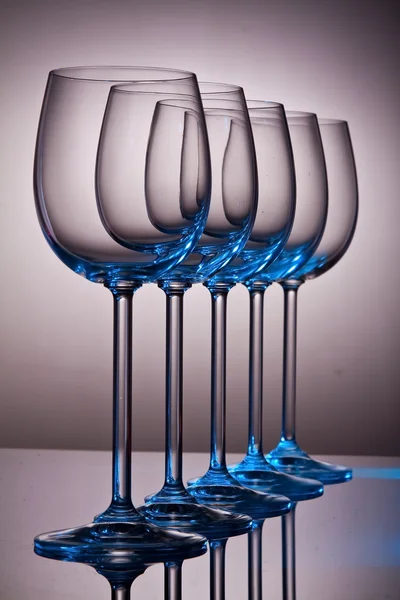Crystal wine glasses in a row — Stock Photo, Image