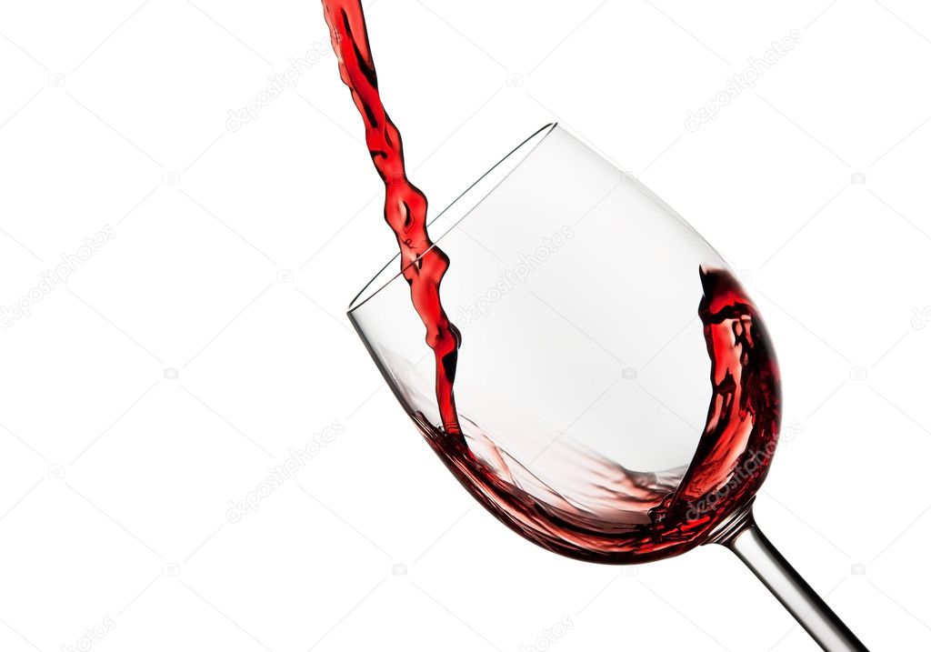 Tilted crystal wine glass with red wine