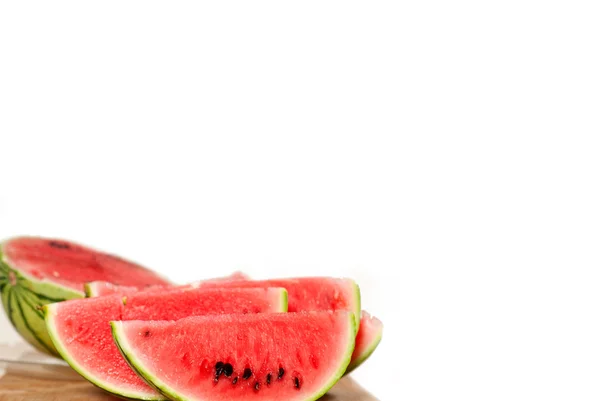 Frische Wassermelone auf einem Holztisch — Stockfoto
