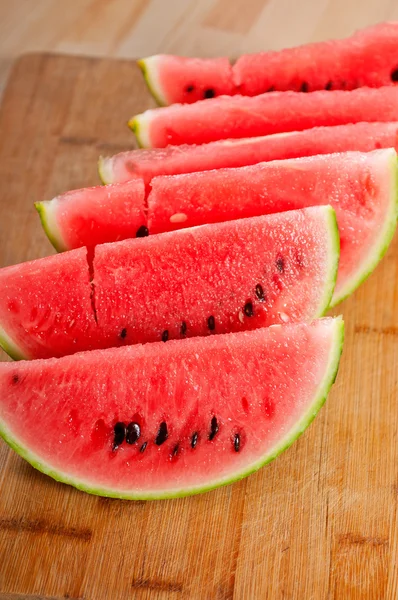 stock image Fresh watermelon on a wood table