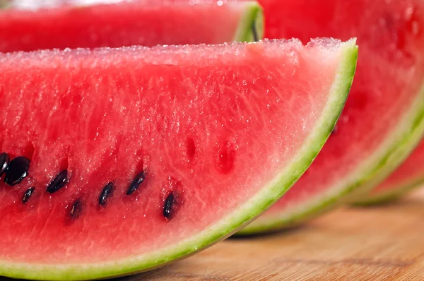 stock image Fresh watermelon on a wood table