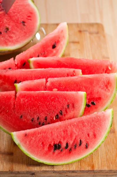 Stock image Fresh watermelon on a wood table