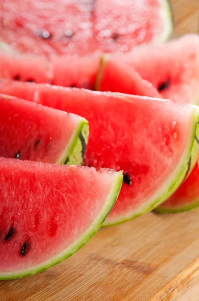 stock image Fresh watermelon on a wood table