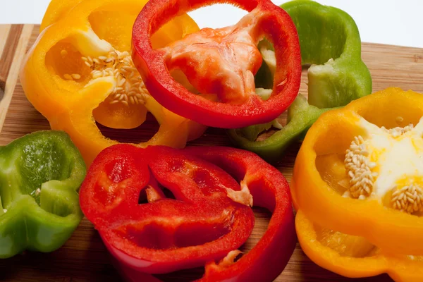 stock image Close up of red, yellow and green peppers