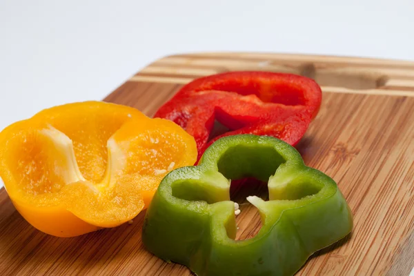 stock image Close up of red, yellow and green peppers