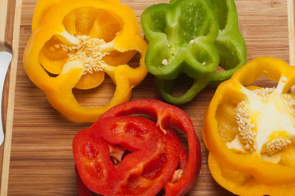 stock image Close up of red, yellow and green peppers