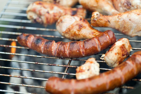Barbecue with delicious grilled meat on grill — Stock Photo, Image