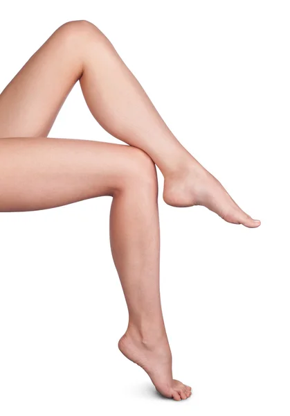 Bella donna gambe isolate sul bianco — Foto Stock
