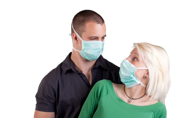 Young wearing flu masks — Stock Photo, Image