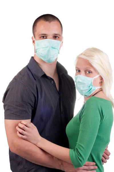 Young wearing flu masks — Stock Photo, Image