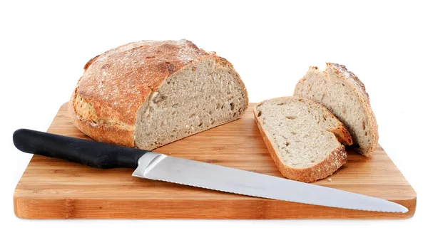 Καρβέλι ψωμί και μαχαίρι — Φωτογραφία Αρχείου
