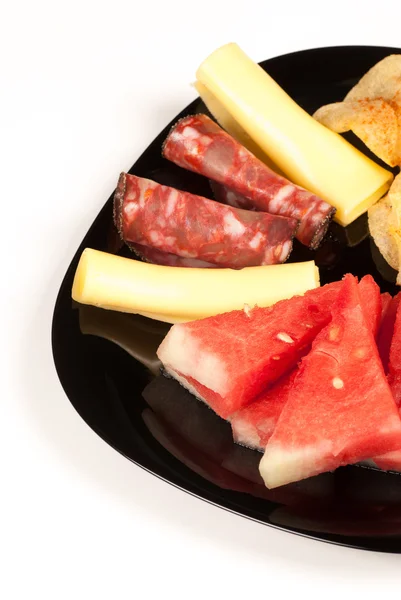 Meloen met koude vleeswaren — Stockfoto