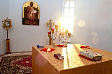 The altar is lit by the early morning sunlight Village Dubki, Saratov region clipart
