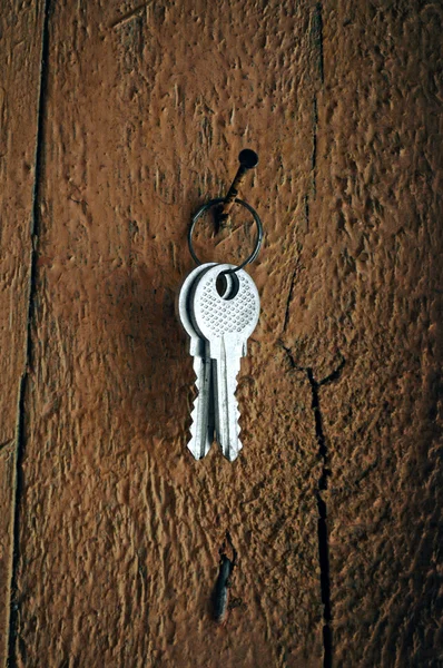 Klíče visí na hřebík — Stock fotografie