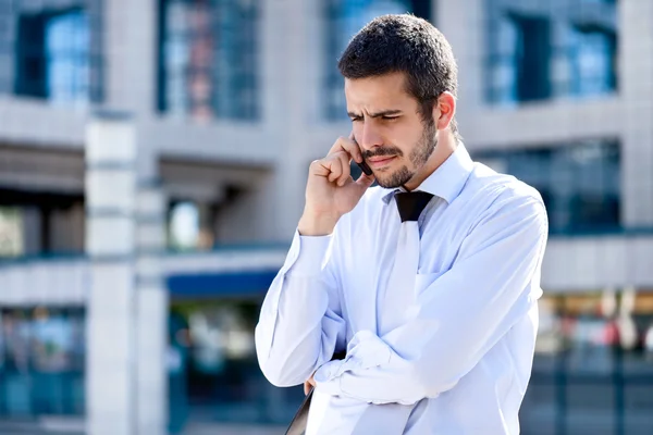 Businessman using a mobile phone — Stock Photo, Image