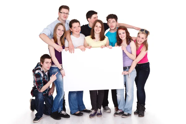 Uśmiechający się grupa przyjaciół z banerem — Zdjęcie stockowe